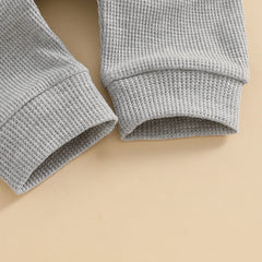 Unisex Waffle Knit Solid Color, Long Sleeve, Button Down Baby Romper