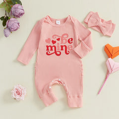 Baby girl Valentine’s jumpsuit with heart print and matching bow headband