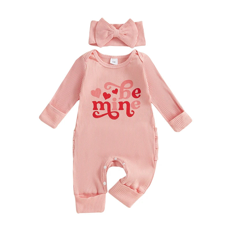 Baby girl Valentine’s jumpsuit with heart print and matching bow headband